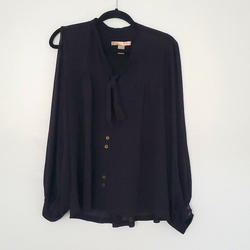 Sheer blouse with bow and sleeve cutouts